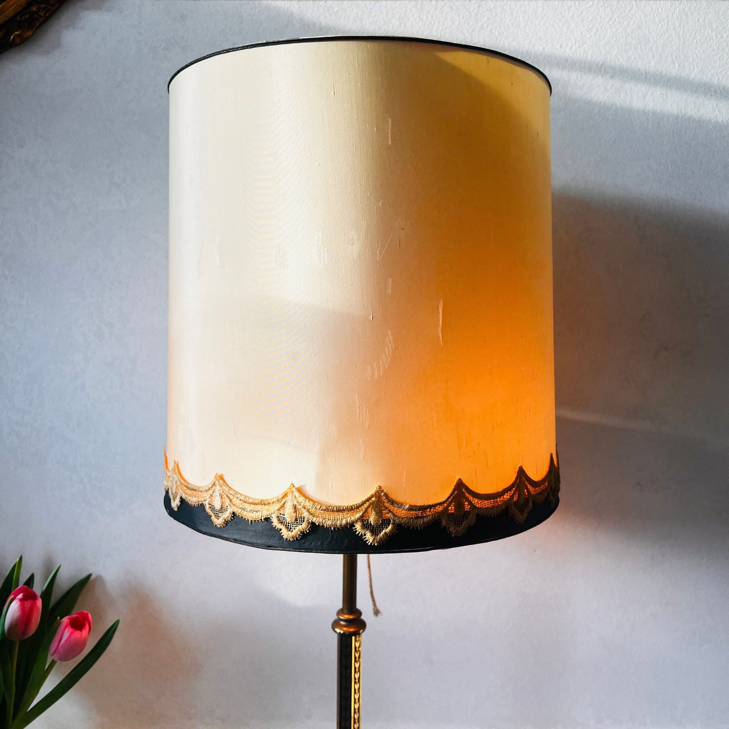 Bronze brass floor lamp with Art Deco style, tripod base and dual lights under a large vintage shade, elegant tall stand lighting
