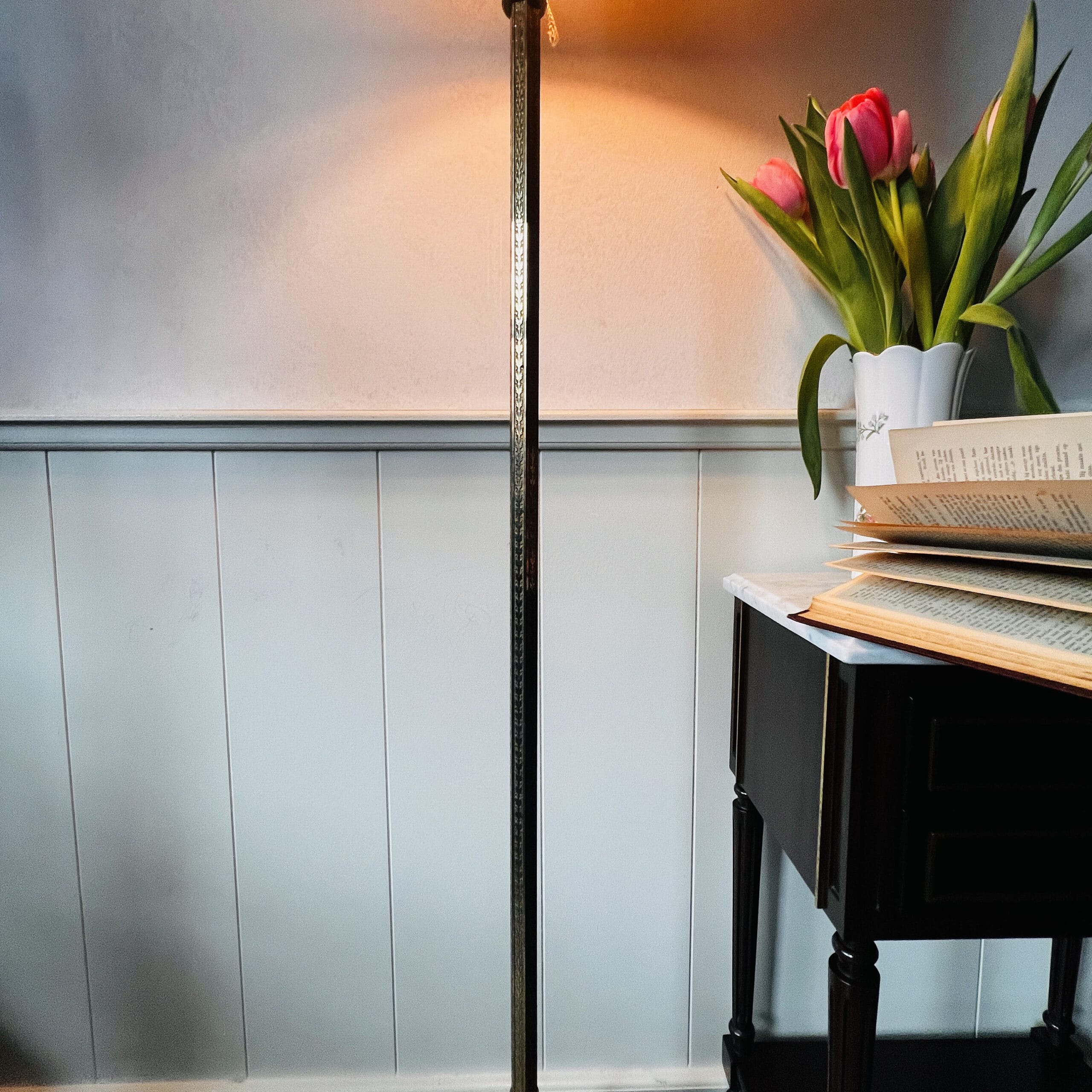 Bronze brass floor lamp with Art Deco style, tripod base and dual lights under a large vintage shade, elegant tall stand lighting