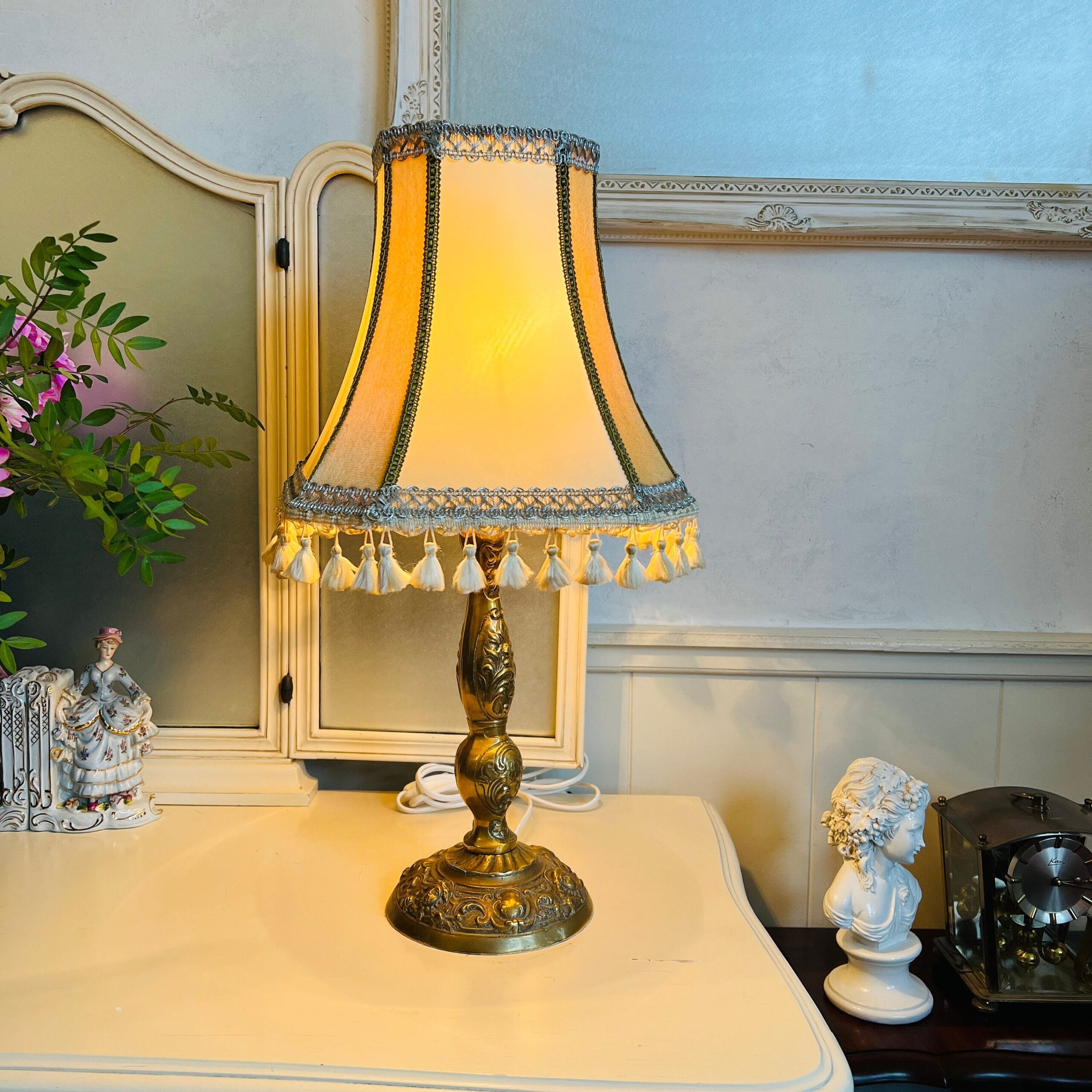 Brass table lamp with fringed shade, 60s vintage lighting for desk or bedside, charming home accent with soft nostalgic glow