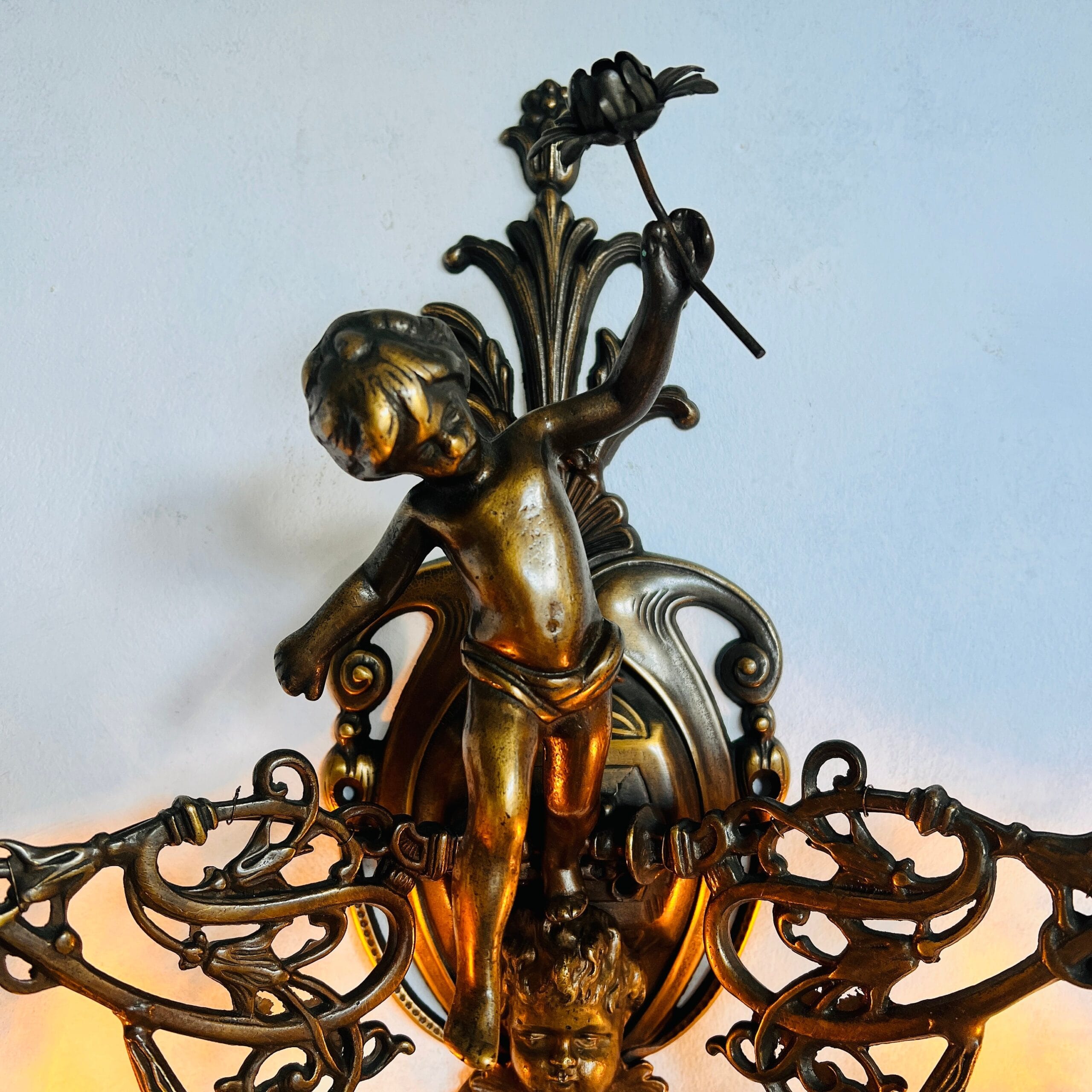 French bronze cherub wall sconce with crystal prisms, 1930s baroque angel lamp, two-arm putti light fixture for home decor