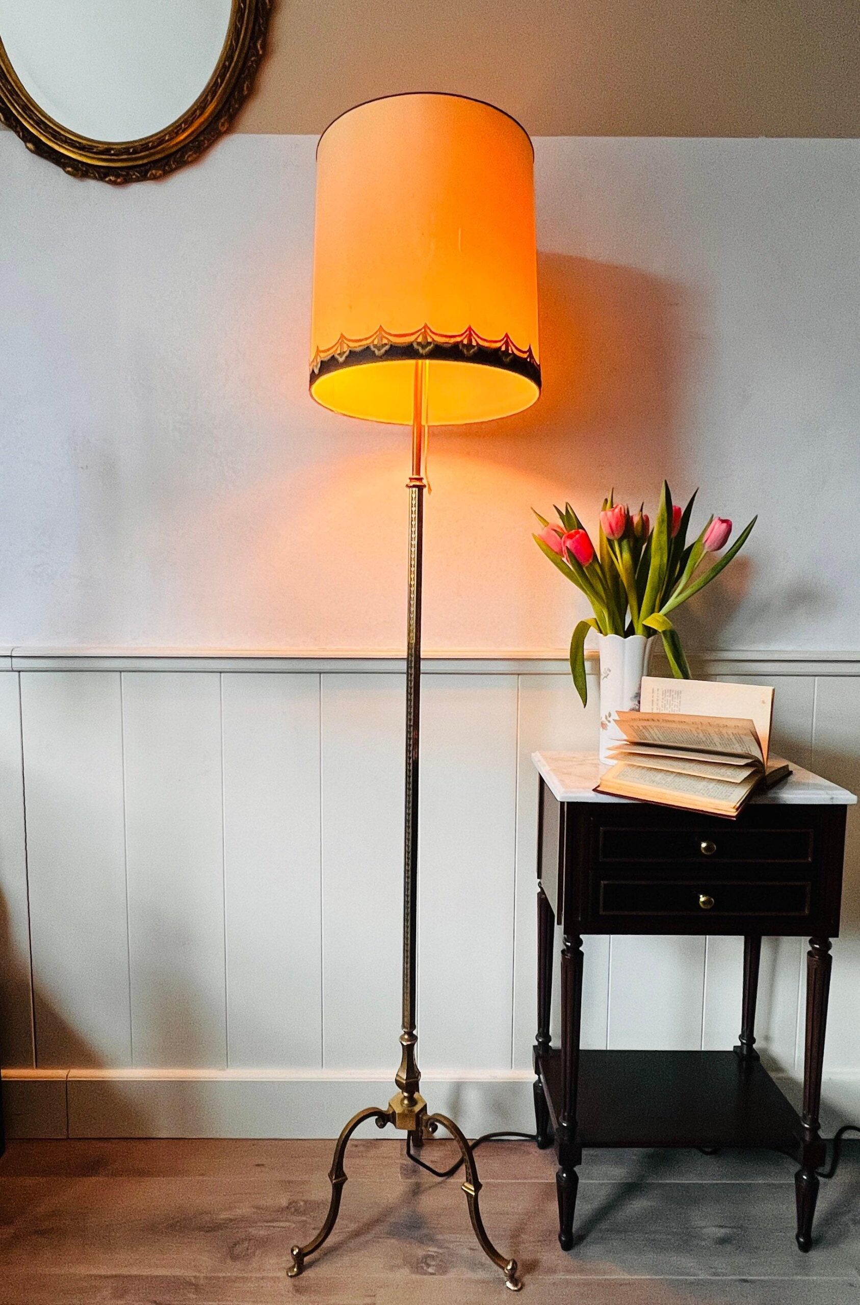 Bronze brass floor lamp with Art Deco style, tripod base and dual lights under a large vintage shade, elegant tall stand lighting