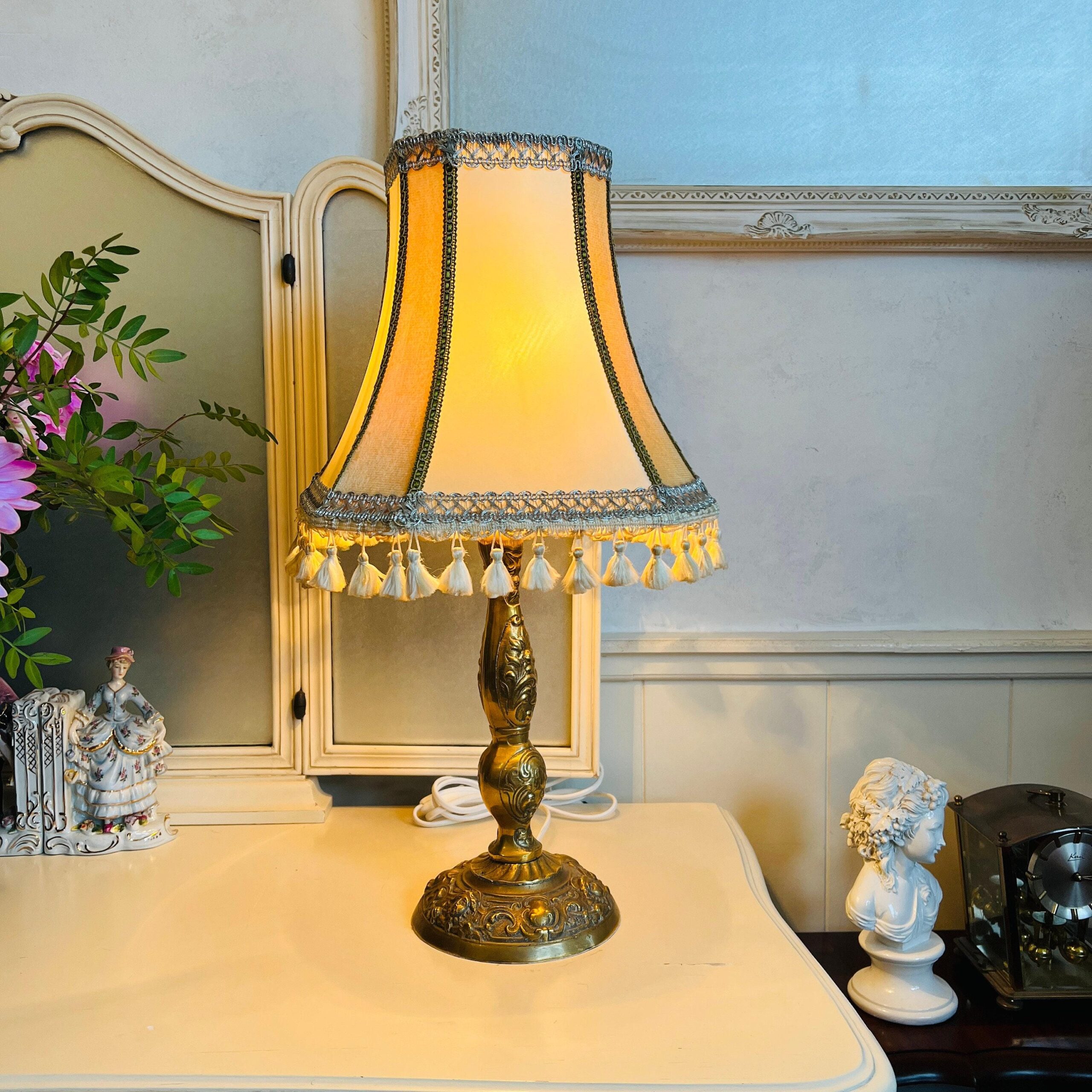 Brass table lamp with fringed shade, 60s vintage lighting for desk or bedside, charming home accent with soft nostalgic glow